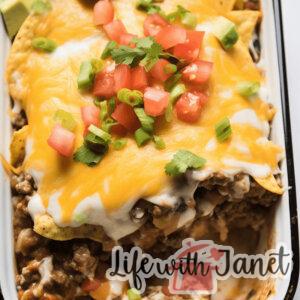 Close-up of a rich and flavorful Tex-Mex burrito casserole, highlighting the cheesy texture and aromatic ingredients.