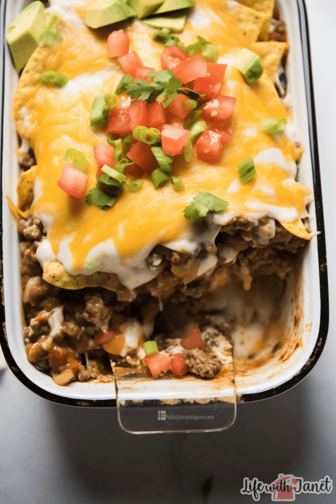 Delicious layers of seasoned beef, cheese, and tortillas in a creamy burrito casserole dish, perfect for weeknight dinners.