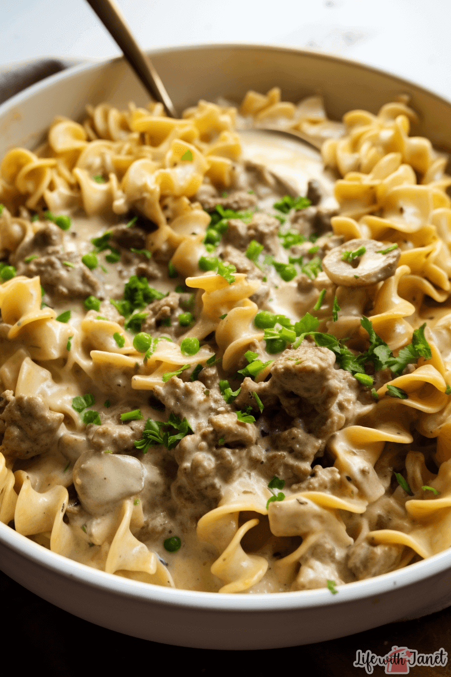 Golden brown, freshly baked Beef Stroganoff Casserole in a dish, with steam rising, indicating its mouth-watering warmth.