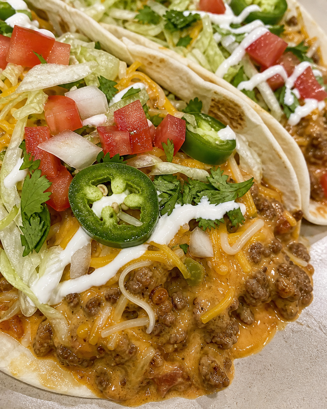 Cheesy Rotel Beef Tacos